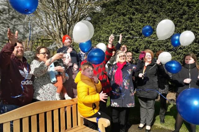 To launch the William Billingsley memorial bench, balloons are let off by his family members and representatives of John Ferneley College, which he attended EMN-190326-135304001