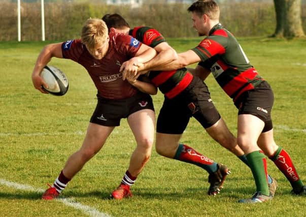 Harry Wood is wrestled into touch as Paviors show their paces EMN-190204-131428002