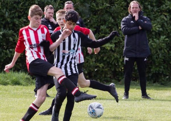 Action from Mowbray's top-of-the-table win over Thurmaston EMN-190204-173151002