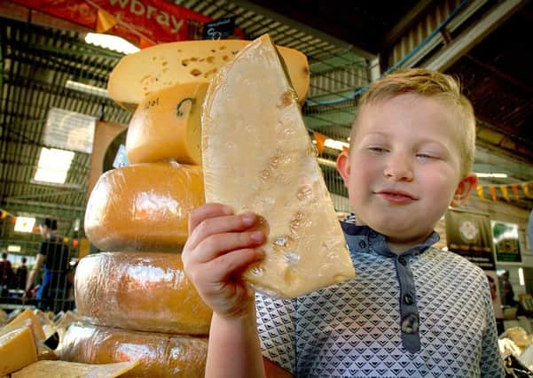 Five-year-old Fletcher Eyre makes his choice of Mayfield Swiss cheese PHOTO: Tim Williams
