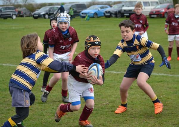 Ford battles through the defence in a great day for Melton RFC U9s EMN-190304-140724002