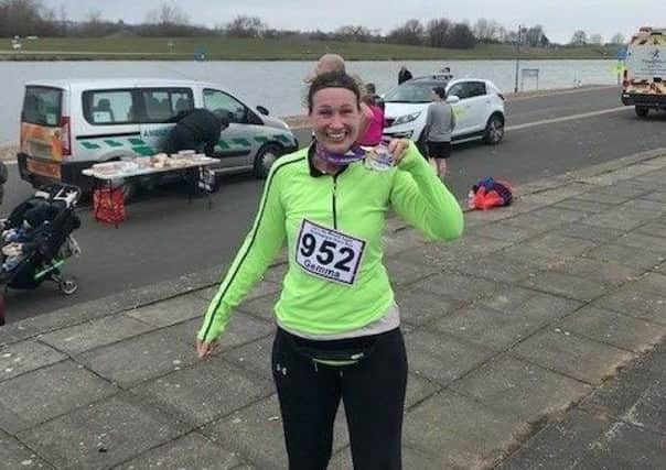 Gemma King looking very pleased after a cold 13-mile race PHOTO: Supplied