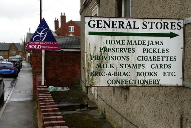 The sign for Twyford's village shop, which is closing after being a feature of the village for the last century EMN-190504-153241001