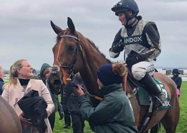 Kelly and jockey Tabitha Worsley share a word after their brilliant Foxhunter Chase win EMN-190904-174019002