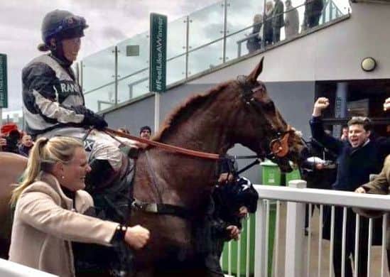 Kelly Morgan leads Top Wood past celebrating punters at Aintree EMN-190904-174008002