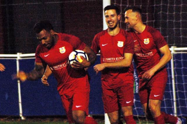 Reeve celebrates his goal with Jordan Lever and Josh Hill EMN-190904-235447002