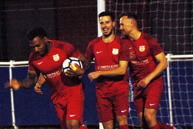 Michael Reeve celebrates his goal with Jordan Lever and Josh Hill EMN-190904-235447002