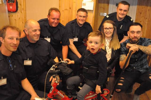 All smiles with Harry on his new trike PHOTO: Jonny McGrady