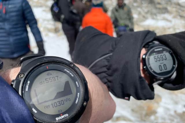 A watch shows the altitude reading for Melton's Ian Kerr and DJ Damion Houchen breaking the world record for performing the highest altitude DJ Set on land (approx 5,590m) on the mountain of Kala Pattar in the Everest region of the Himalayas EMN-191204-111417001