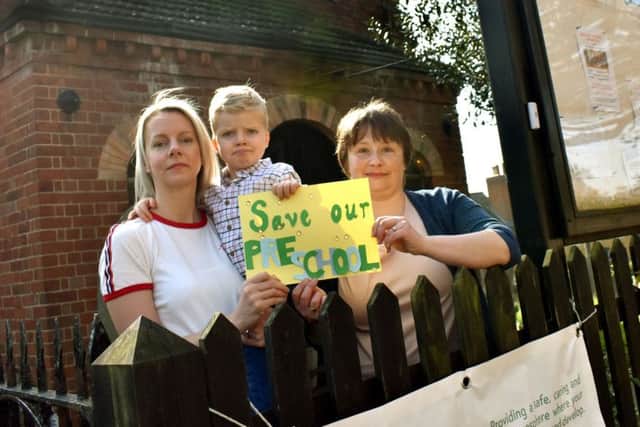 Two mums with children at the pre-school group at Scalford Methodist Church react to neww of the building's impending closure EMN-190422-103321001