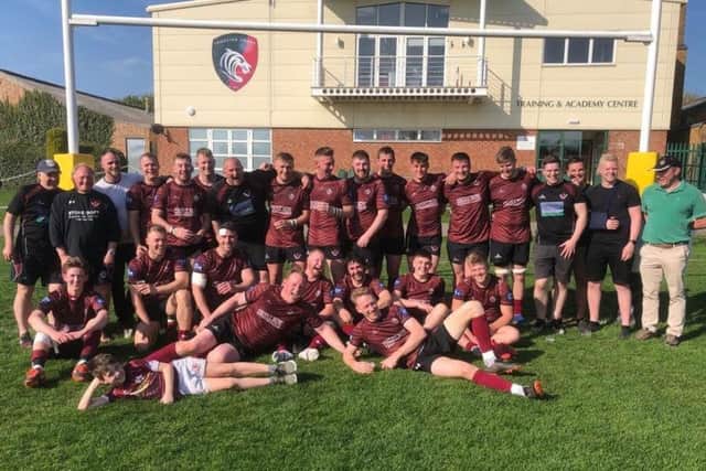 Collins (lying, front right) with the Melton RFC squad at Oval Park EMN-190423-145507002