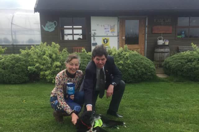 Anna, Noodle and Richard one of Hope Against Cancer's volunteers PHOTO: Supplied