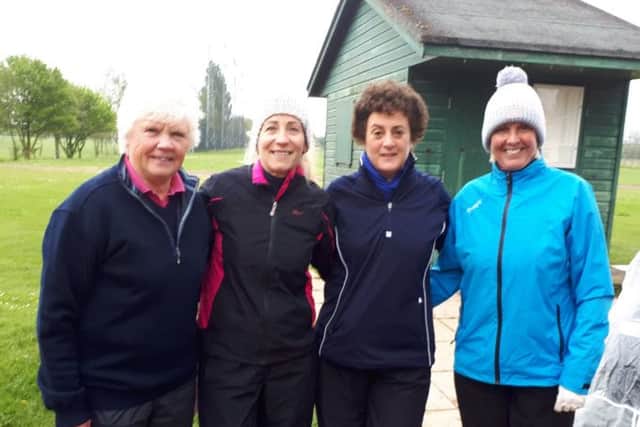 Woolly hats and waterproofs were a necessity for the Melton team last week. From left - Avis, Paula, Nancy and Karen EMN-190514-150649002