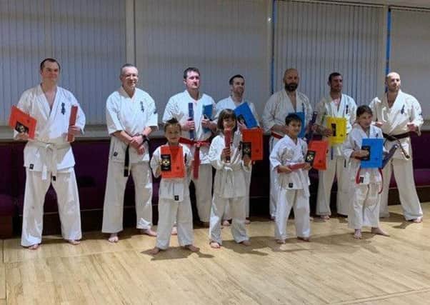 The successful Ronin Kyokushin Karate Club students with new belts EMN-190513-084057002