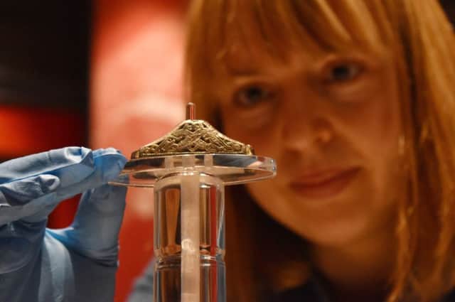 One of the new artefacts at Melton Carnegie Museum, an Anglo-Saxon silver guilt sword pommel cap, dating from between 500 to 700 AD EMN-190514-150602001