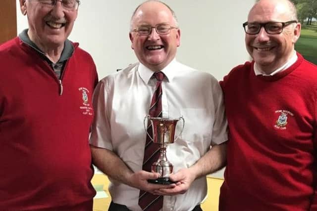Seniors captain Cliff Mills (left) with Open champion Jeff Purdy and organiser Mike Dickinson EMN-190514-152543002