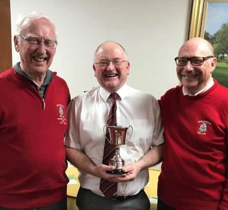 Seniors captain Cliff Mills (left) with Open champion Jeff Purdy and organiser Mike Dickinson EMN-190514-152543002