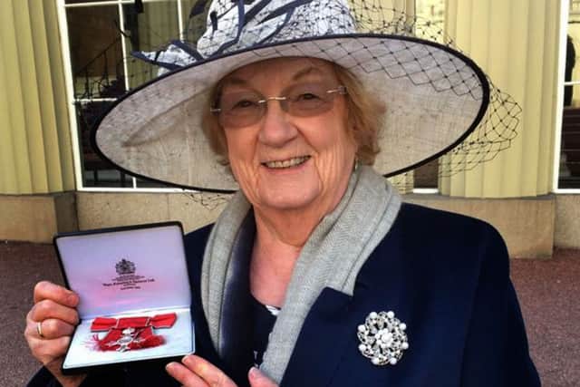 Pam Posnett with the MBE she received in 2017 for services to the local community EMN-190515-155932001