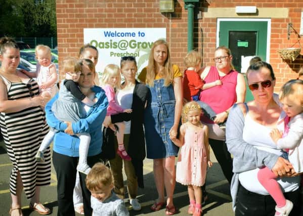 Some of the mums who have children at the Oasis Family Centre, in Melton, which is threatened with closure, including petition organiser Rachel Branston (right) EMN-190515-105856001