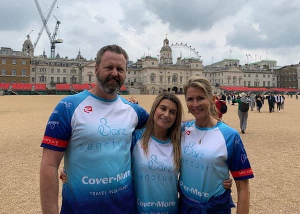 London Bridge terror attack survivor Holly Jones with the parents of the youngest victim, Sara Zelenak, Mark and Julie, as they prepare for a charity cycle ride to Paris in Sara's memory EMN-190521-160947001