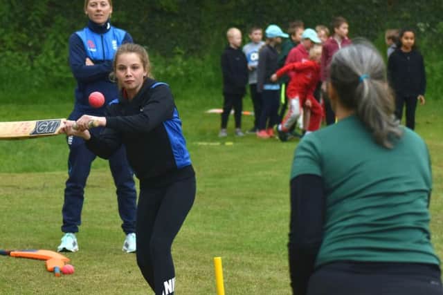 The England skipper oversees some coaching with the Marko Marvels EMN-190522-115949002