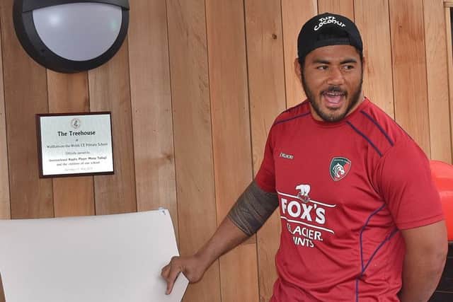 England and Leicester Tigers rugby star Manu Tuilagi unveils the plaque as he visits Waltham Primary School to officially open their new classroom building EMN-190522-151057001