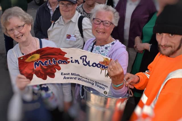 Representatives of Melton in Bloom and Melton Borough Council prepare for the Melton spring clean initiative EMN-190524-125144001