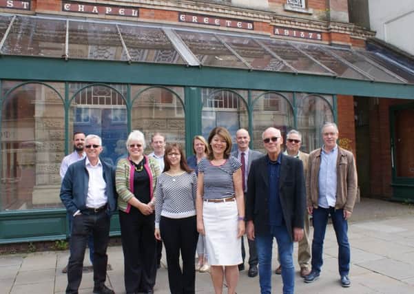 From left, outside the former baptist chapel in Melton - which is due to become the new HQ for the Melton Vineyard Church -  Back Row, Tom Woodhead and Gary Roche (Woodhead Group), Abi Powell (Hookway Design), Andrew Banister (Scape Group), Tom Allen (Artistic Industries) and Neal Swettenham, of Melton Vineyard Church; Front Row, Phil Johnson, Alison Johnson, Maria Twittey, Eluned Owen and
Bernie Carter, all of Melton Vineyard Church EMN-190528-154918001
