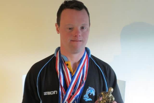 Andy, with his East Midlands overall champion trophy, first swam for GB aged 21 EMN-190529-125811002