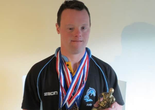 Andy, with his East Midlands overall champion trophy, first swam for GB aged 21 EMN-190529-125811002