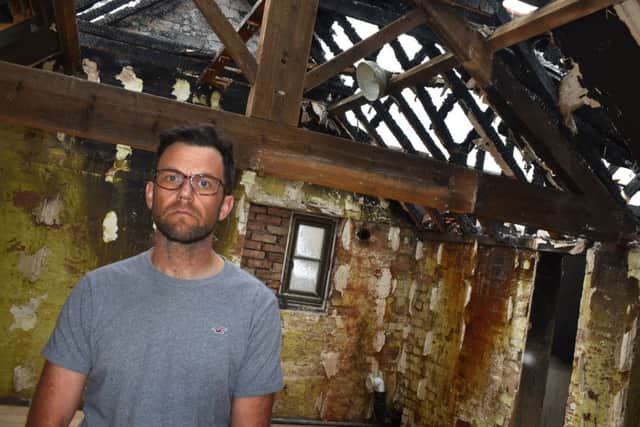 Richard Watkin, in his severely-damaged Bottesford home EMN-190306-174504001