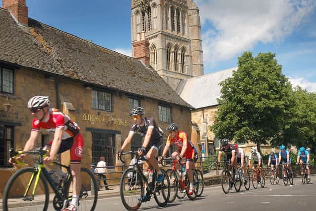 The junior race rolls out past St Mary's Church EMN-190530-114653002