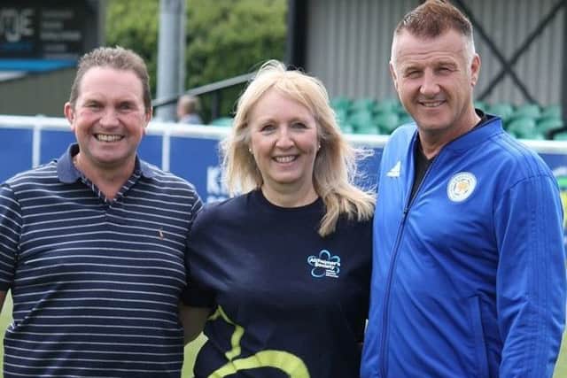Steve Freer (left), who suffers from dementia, takes part in a campaing to raise awareness of the condition with Helen Whittington, of the Alzheimer's Society, and former Leicester City FC skipper, Steve Walsh EMN-190531-171900001