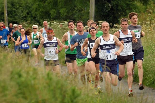 The 2014 Stathern 10k approaches Plungar EMN-190406-120406002