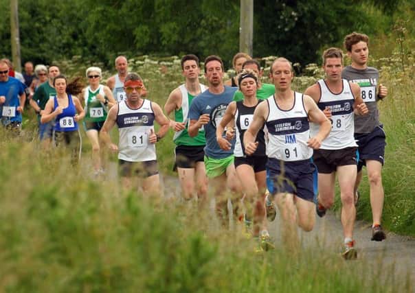 The 2014 Stathern 10k approaches Plungar EMN-190406-120406002