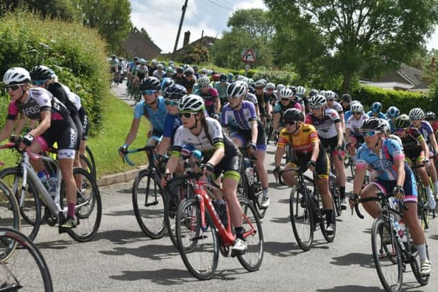 The field rolls out through Burton Lazars just before the crash which halted the race. EMN-191006-083113002