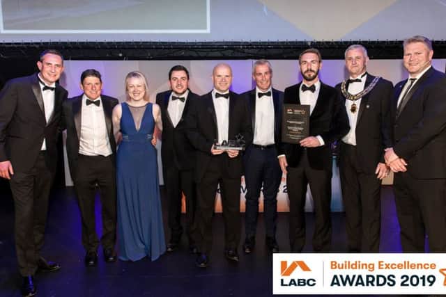 The team from HSSP and M Snutch Builders & Contractors with their award.
