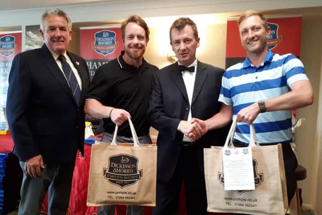Fourth-placed T. Buxton and T. Lee with Rutland Weekender Jute Hampers with club captain Gerry Stephens (left) and Stephen Hallam of Dickinson and Morris (second right) EMN-191106-104836002
