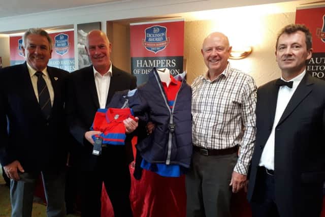 Melton Mowbray Golf Club captain Gerry Stephens (left) and Stephen Hallam (right) with Pork Pie Open winners Steve Goddard and Phil Curtis EMN-191106-104824002