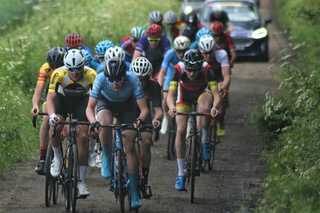 The junior men storm along Sawgate Lane heading towards the finish EMN-191106-132213002