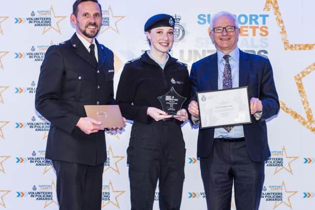 Meltons Head Cadet Bradie Smith is presented with the VPC Special Recognition Award at the Leicestershire Police Volunteers in Policing Awards night EMN-191106-151206001