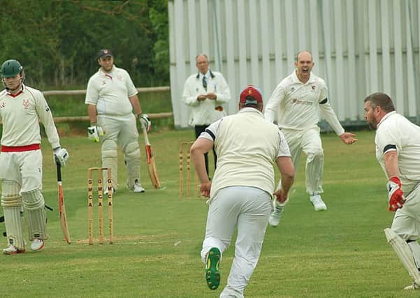 Tom Glover shows some derby passion after taking the key wicket of Myles Hickman in their first meeting last season EMN-191206-142321002