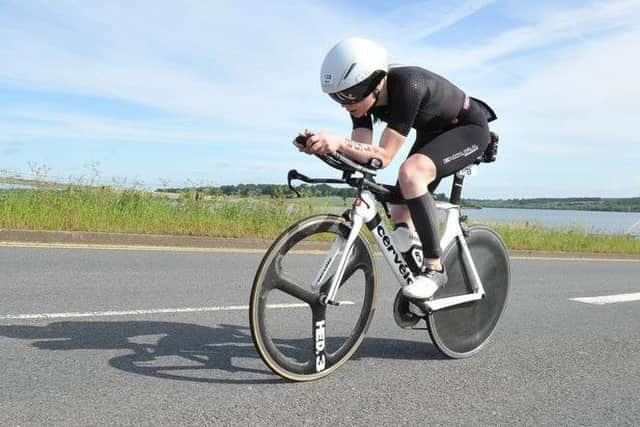 Bex hits the bike on the second leg of her half-ironman EMN-190619-095150002