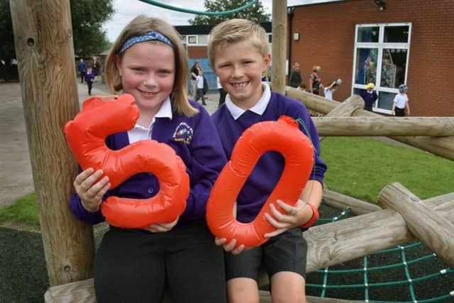 Year 3 pupils Mabel and Charlie celebrate the 50th anniversary of their school, Sherard Primary School being opened EMN-190619-104735001