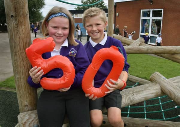 Year 3 pupils Mabel and Charlie celebrate the 50th anniversary of their school, Sherard Primary School being opened EMN-190619-104735001