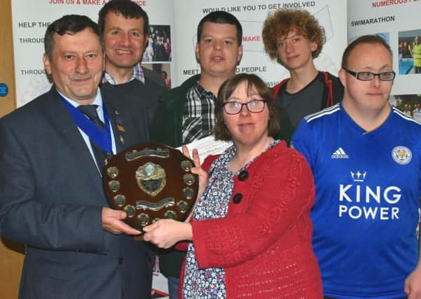 The Melton Times Shield for the most sponsorship raised was won by Melton Mencap Marvels, and presented by Lion Geoff Tate PHOTO: Tim Williams