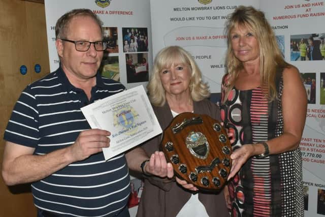 The Melton Mowbray Building Society Shield for the most lengths was won by Wednesday Nighters 1 team, and presented by Lion Wanda Buffey PHOTO: Tim Williams