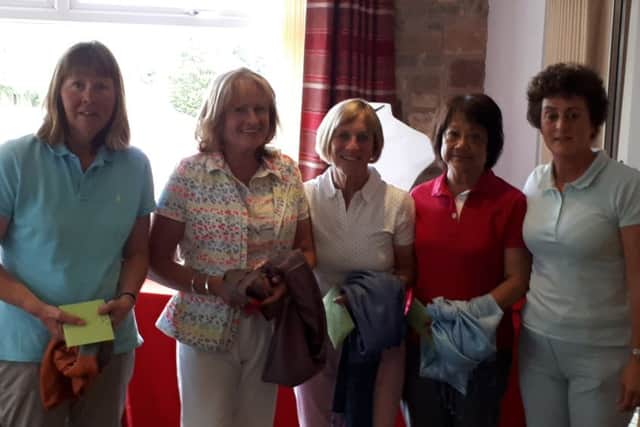 The Belton Woods winning team with Melton Mowbray GC lady captain Nancy Denny (right) EMN-190625-131428002