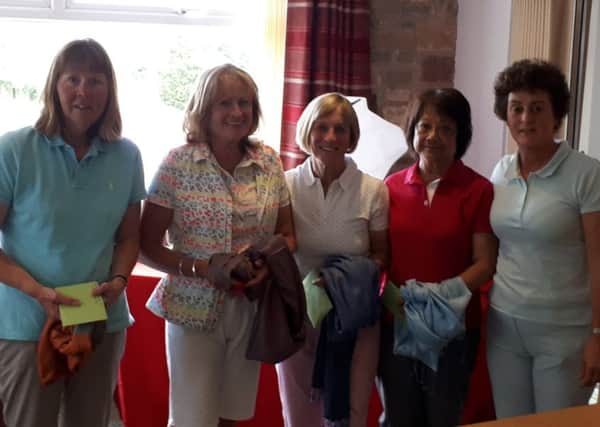 The Belton Woods winning team with Melton Mowbray GC lady captain Nancy Denny (right) EMN-190625-131428002