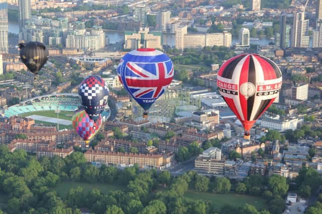 The Belvoir Brewery balloon flies over the city of London in the Ricoh Lord Mayors Hot Air Balloon Regatta
PHOTO MARCUS GREEN EMN-190621-163803001